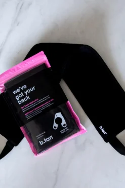b.tan Selvbruner<We've Got Your Bag påførringshandske til ryggen